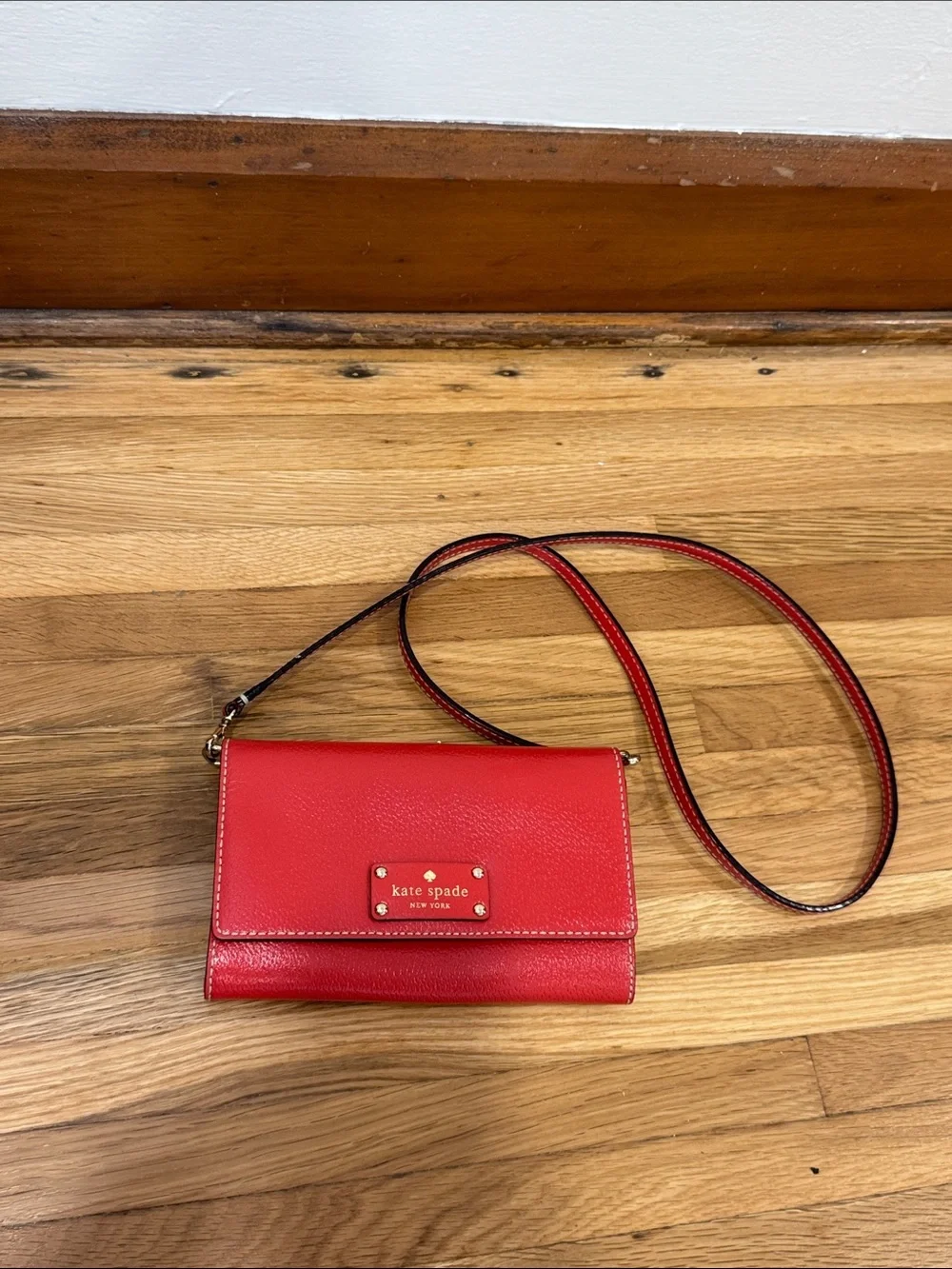 kate spade Red Pebbled Leather Crossbody Wallet with Gold Logo Plate